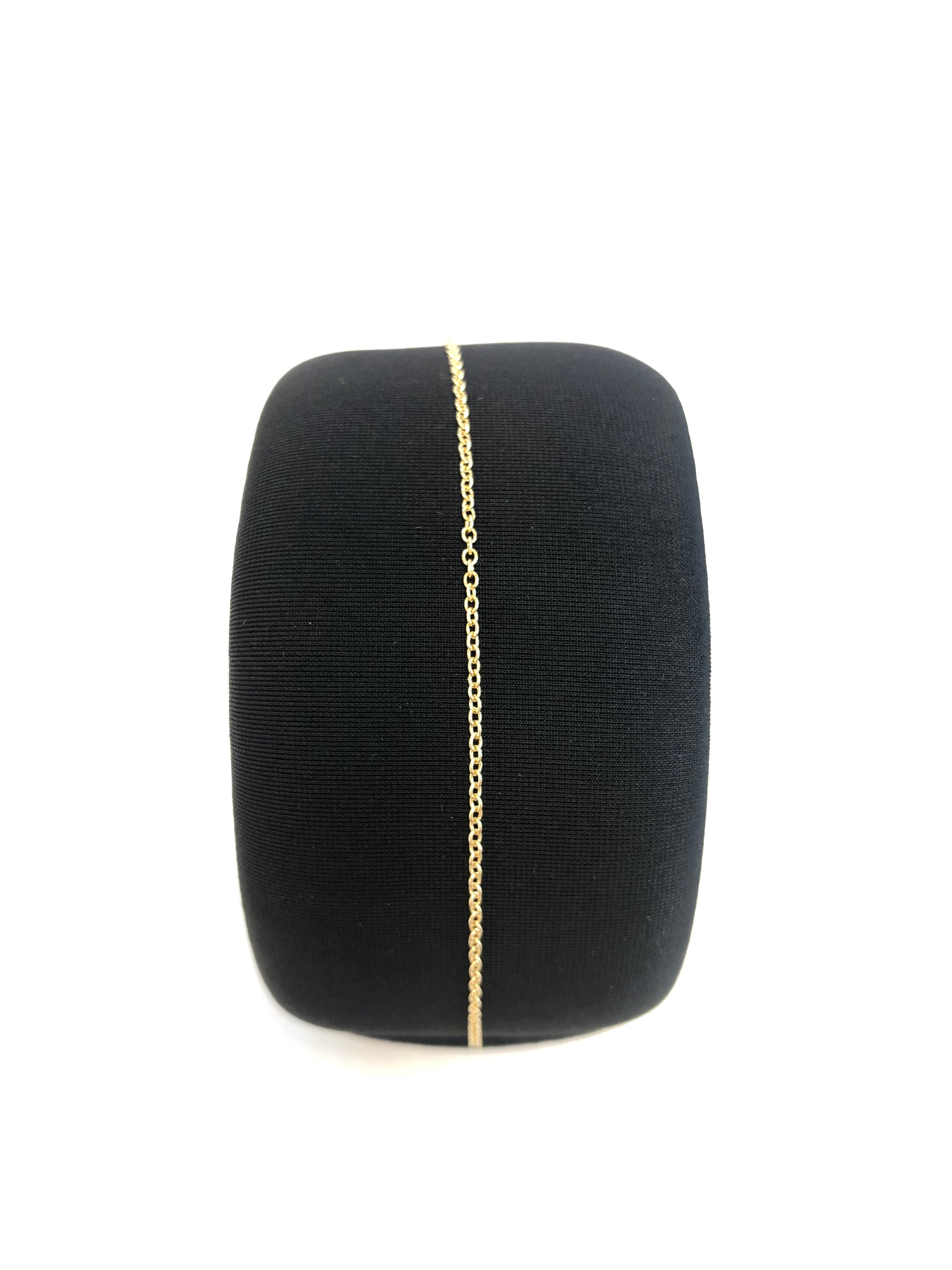 Bracciale in oro giallo saldato al polso in catena rolò sottile