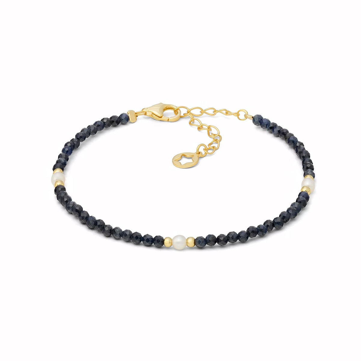 Bracciale Comete in argento con radice di zaffiro blu intenso e perle