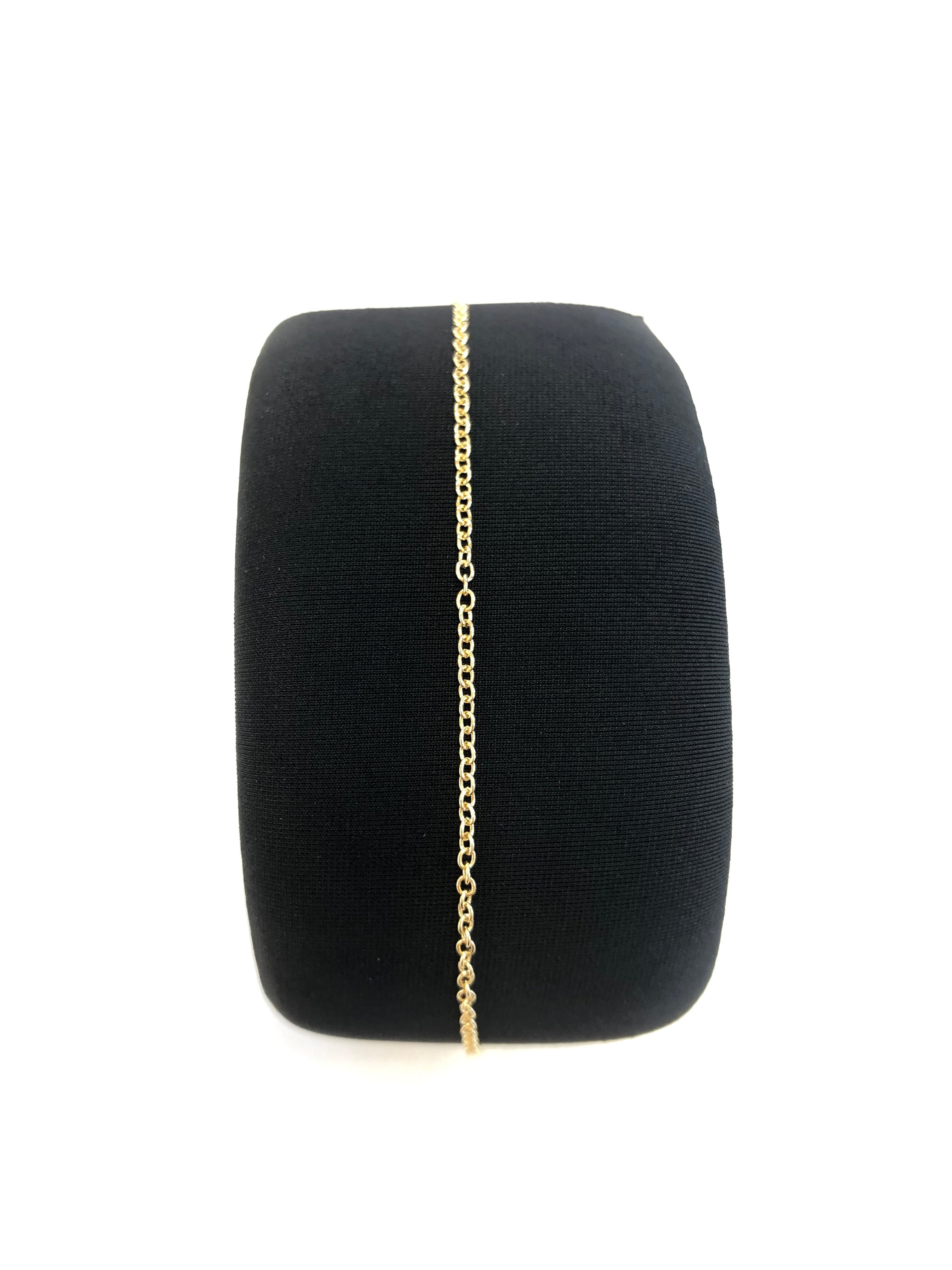 Bracciale in oro giallo saldato al polso in catena rolò media